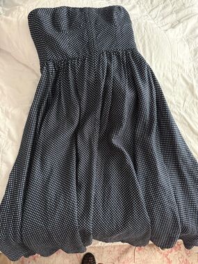 Beautiful Reformation navy with white polkadot  dress with pockets!